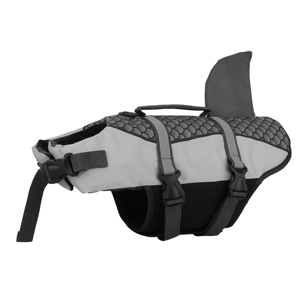 Gray dog life jacket with a shark fin, scale pattern, and adjustable black straps.