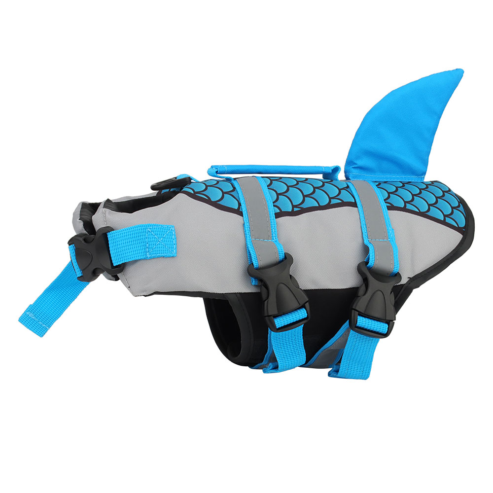 Gray and blue dog life jacket with a shark fin and scale pattern, featuring adjustable straps.