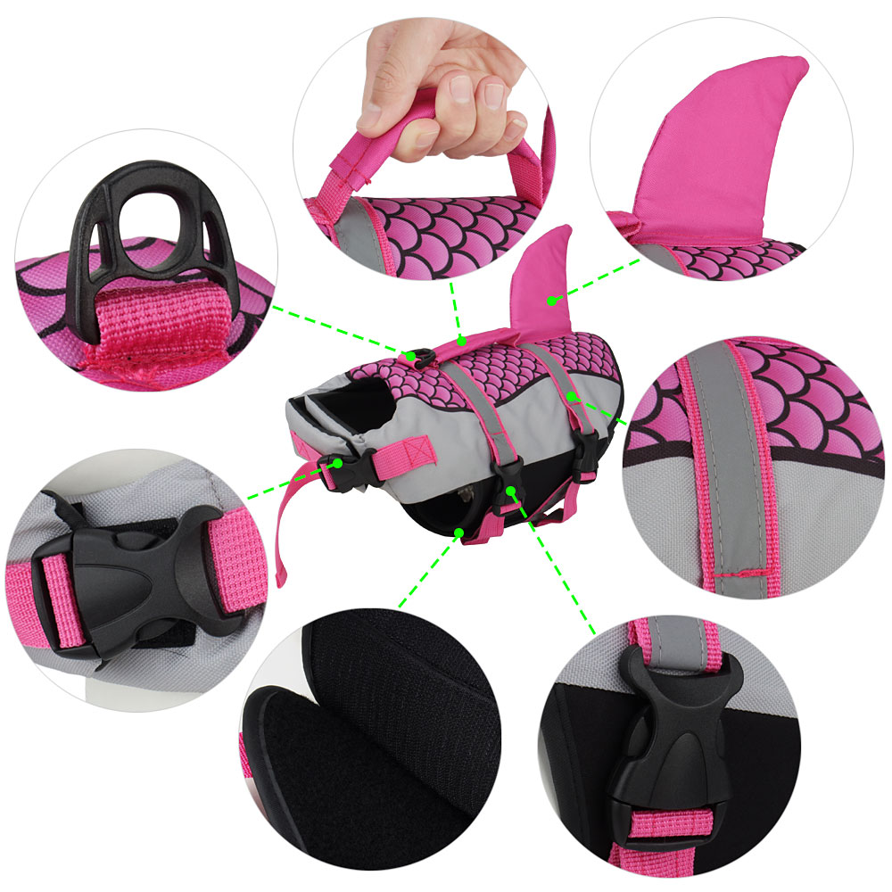 Pink and gray dog life jacket with fin, handle, and buckle details in circular insets.
