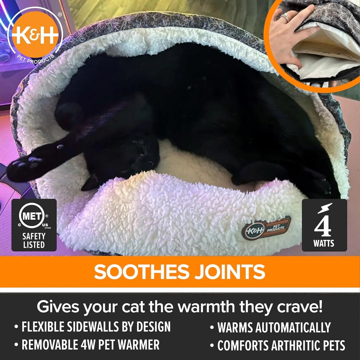 Black cat sleeping in a cozy, white-lined pet bed with product features and logos displayed.