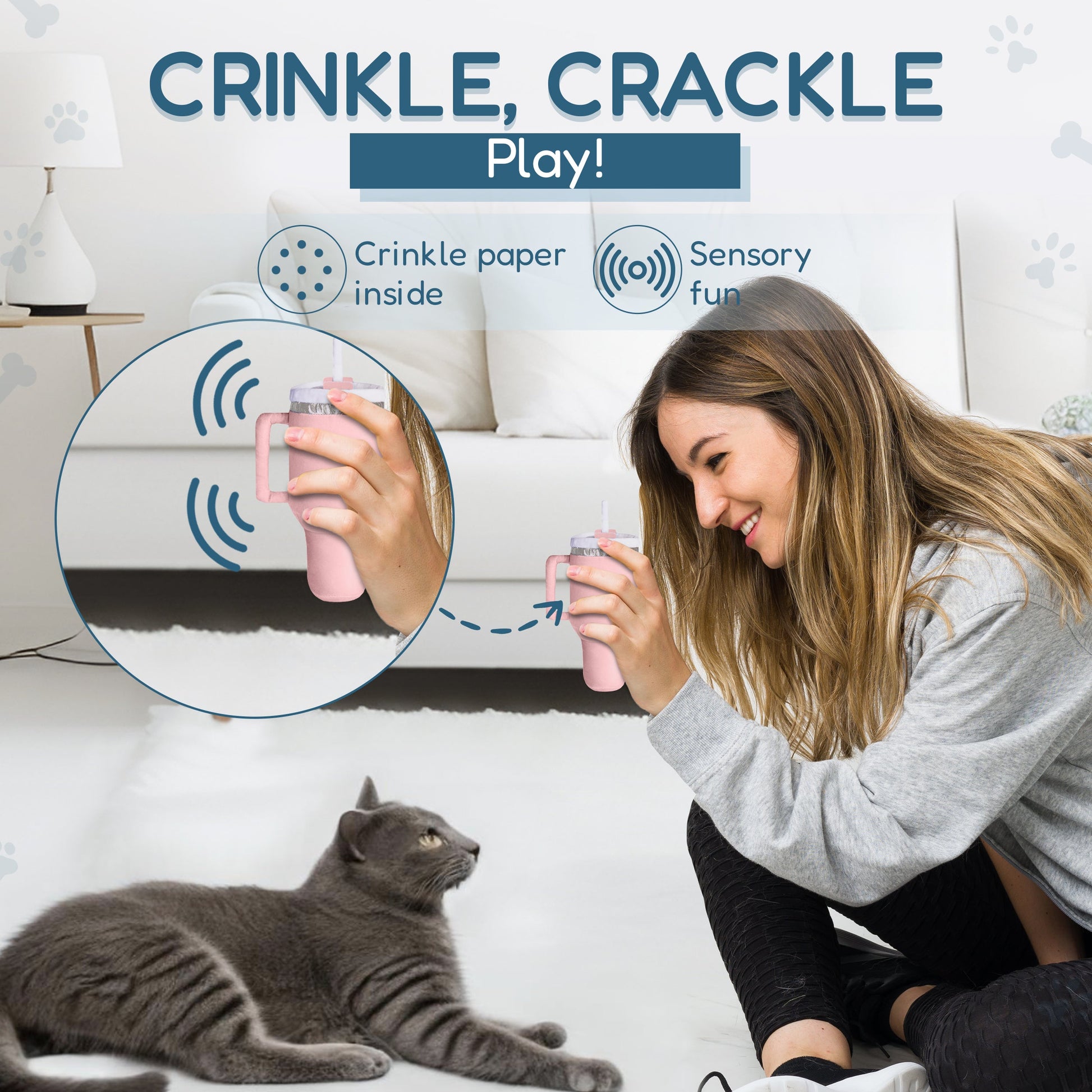 Woman playing with a gray cat using a pink crinkle toy in a bright living room.