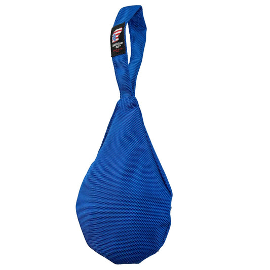 Blue textured dog toy with a loop handle and a small black label near the top.