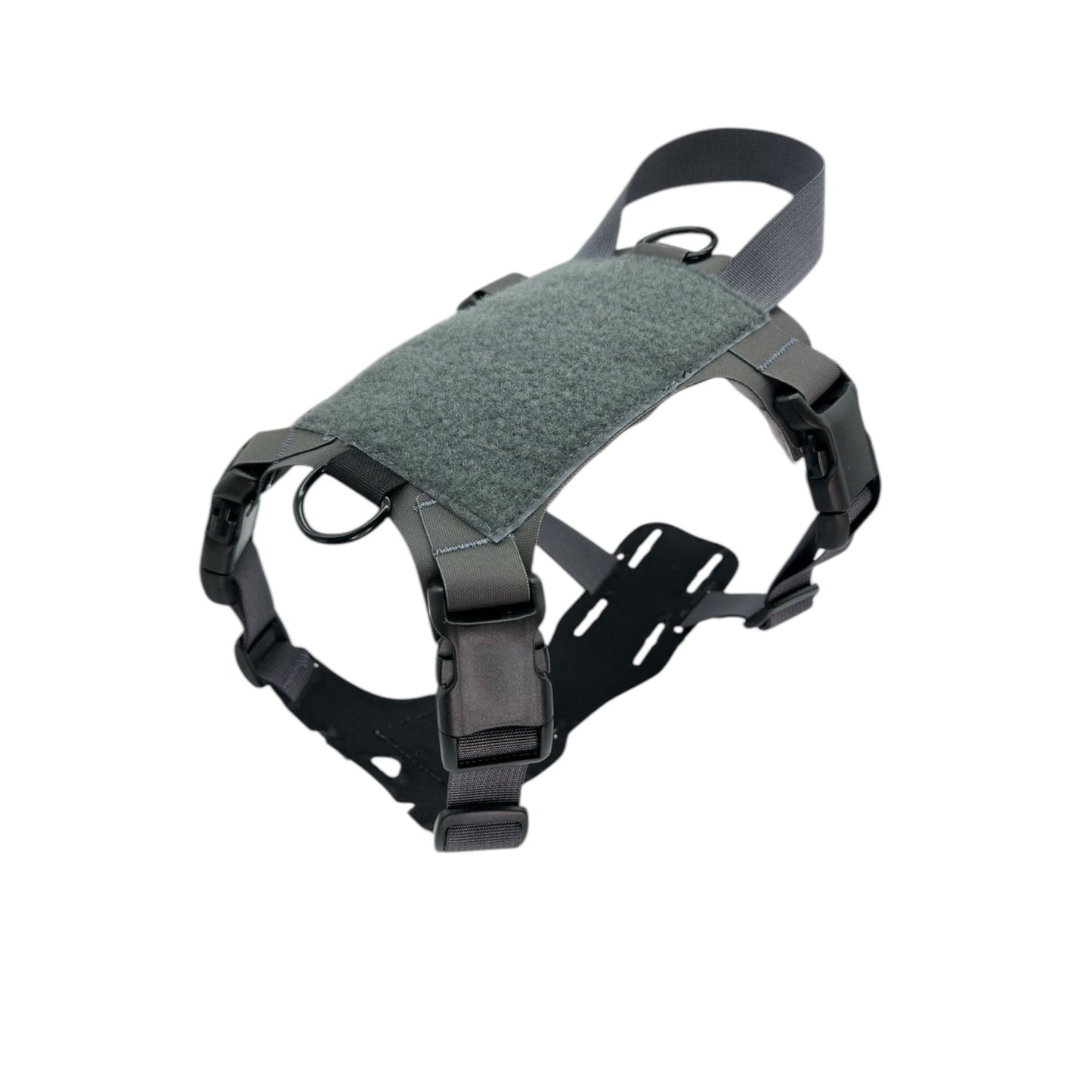 Gray tactical harness with adjustable straps, buckles, and a soft padded top panel.