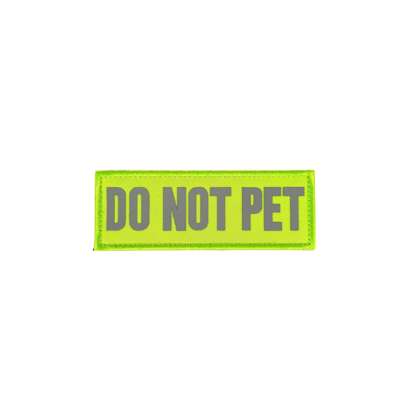 Bright yellow patch with bold gray text reading "DO NOT PET."