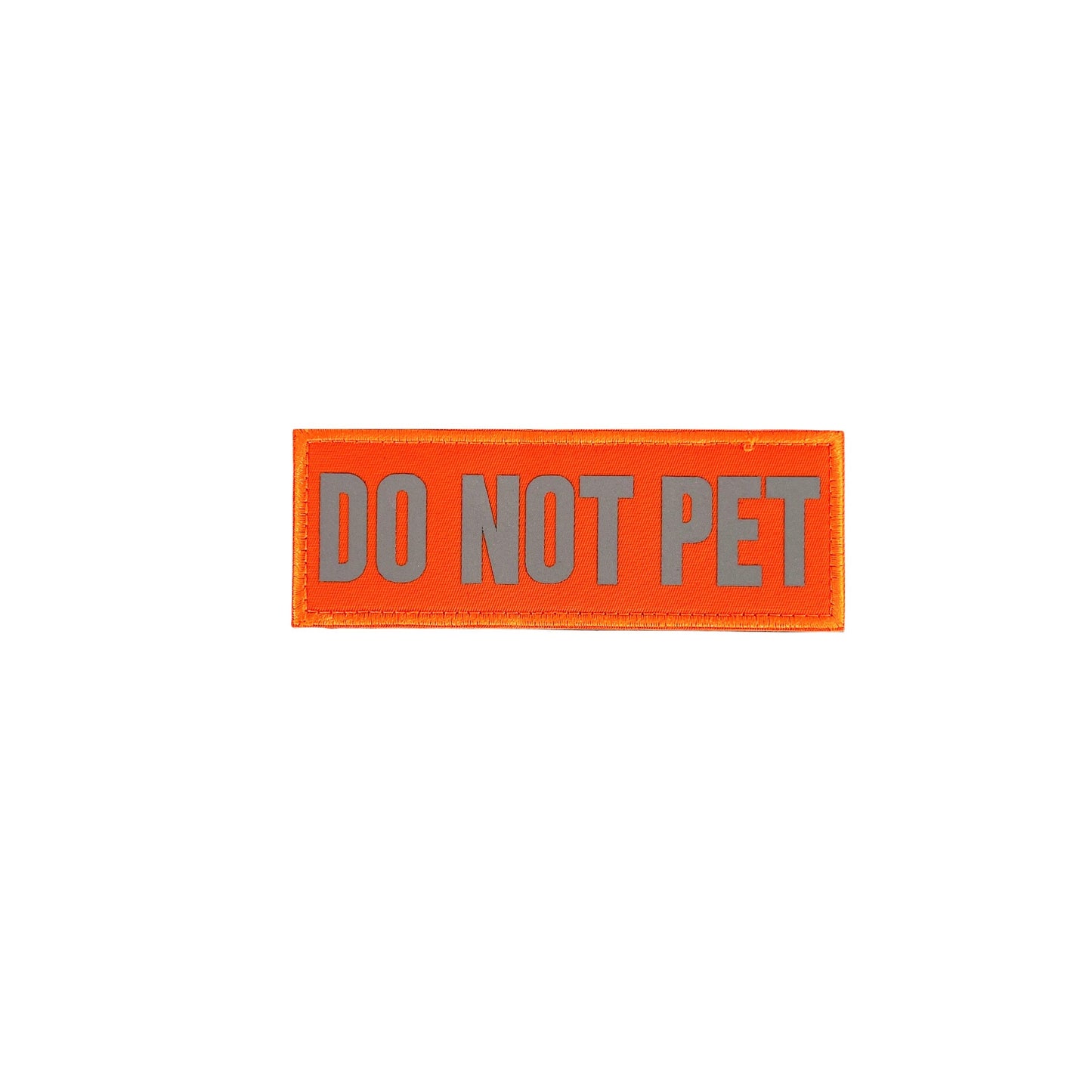 Orange patch with gray text "DO NOT PET" on a white background.