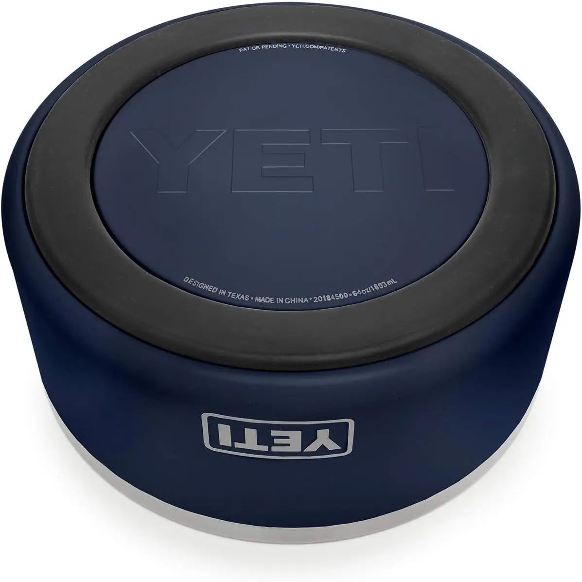 Dark blue YETI dog bowl with black rim and embossed logo on the base.