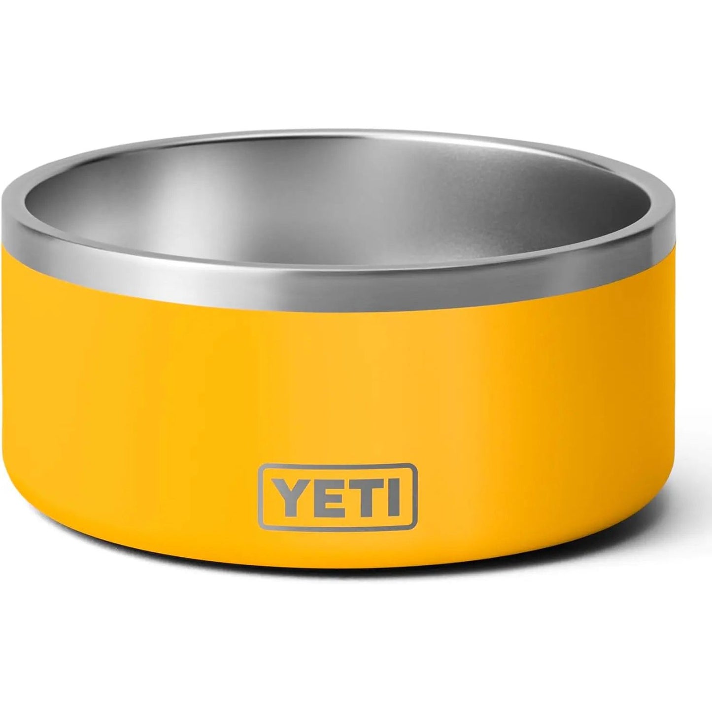 Yellow metal bowl with a silver interior and a logo on the side.