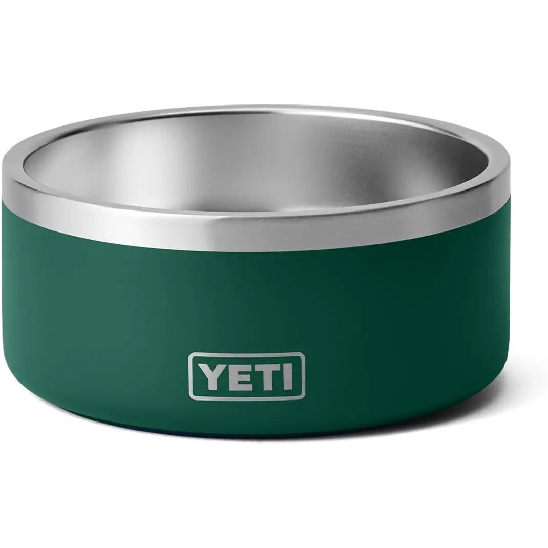 Dark green metal bowl with silver rim and "YETI" logo on the side.