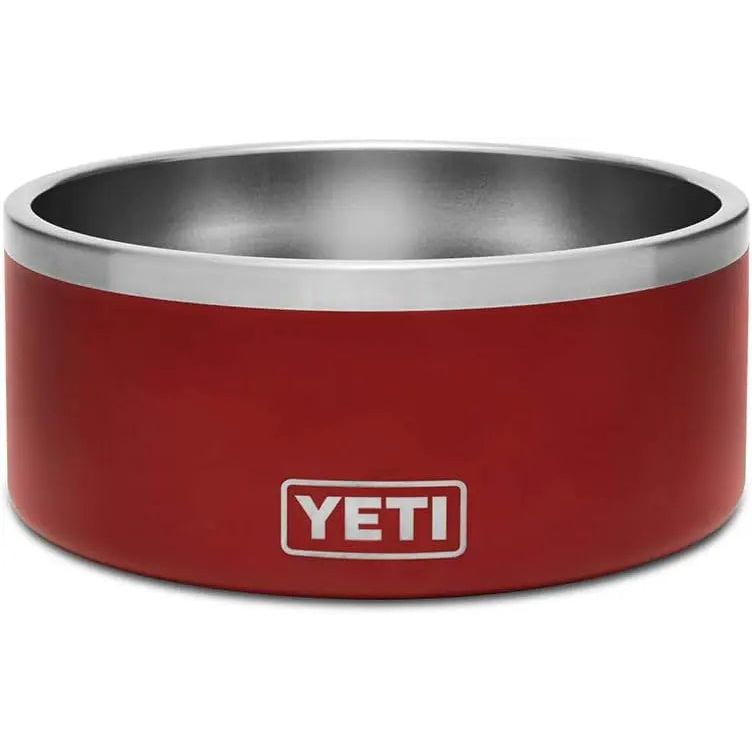Red metal bowl with a silver rim and "YETI" logo on the side.