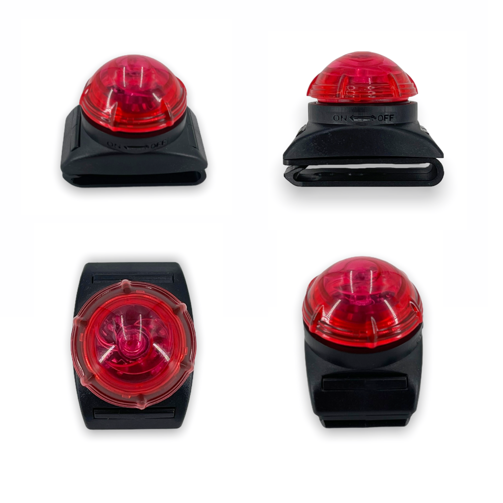 Four red LED bike lights on black bases, shown from different angles against a white background.