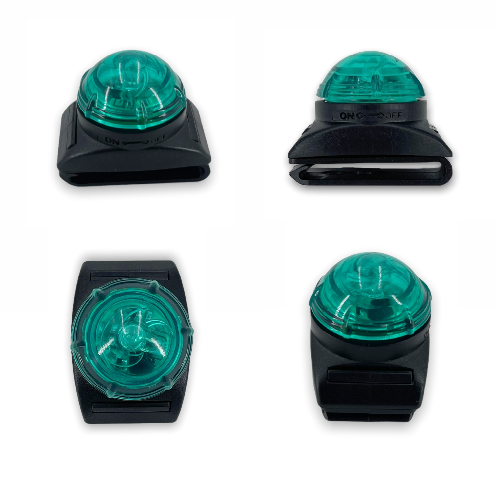 Four black clips with teal domed tops, shown from different angles on a white background.